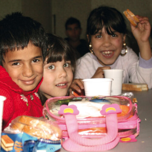 Children eating snacks at school