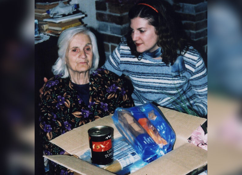Tues - Woman Receives Food Parcel in Bulgaria