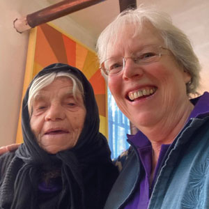 Grace Bryers, right, with a lady she met on the trip