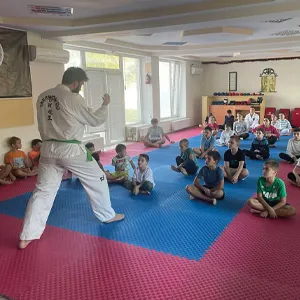 Andrei leads a taekwondo class